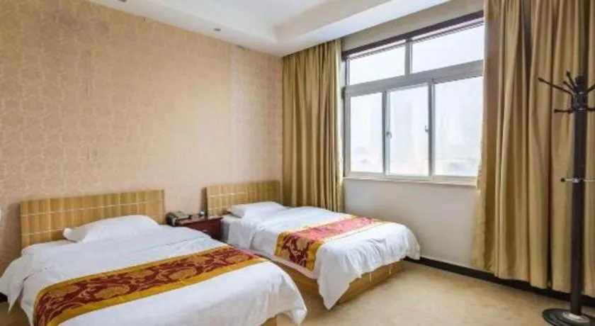 Bed in 169 Business Hotel