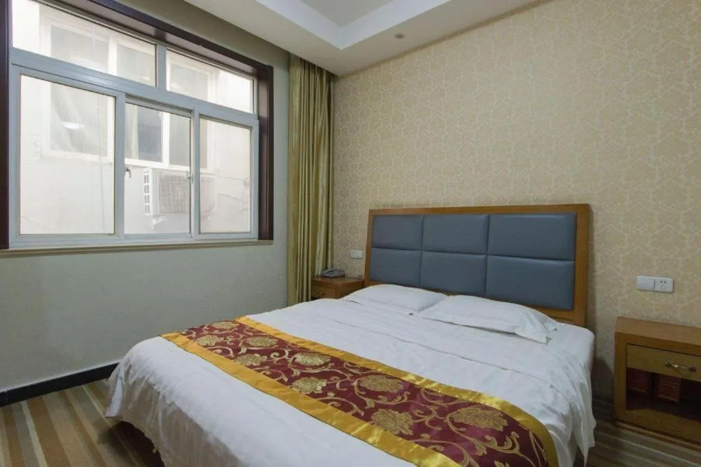 Bed in 169 Business Hotel