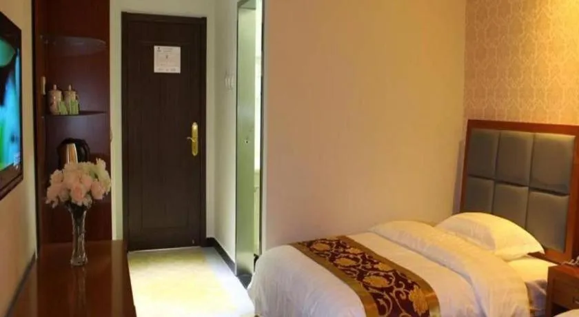 Bed in 169 Business Hotel