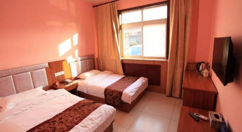 Bed in 169 Business Hotel