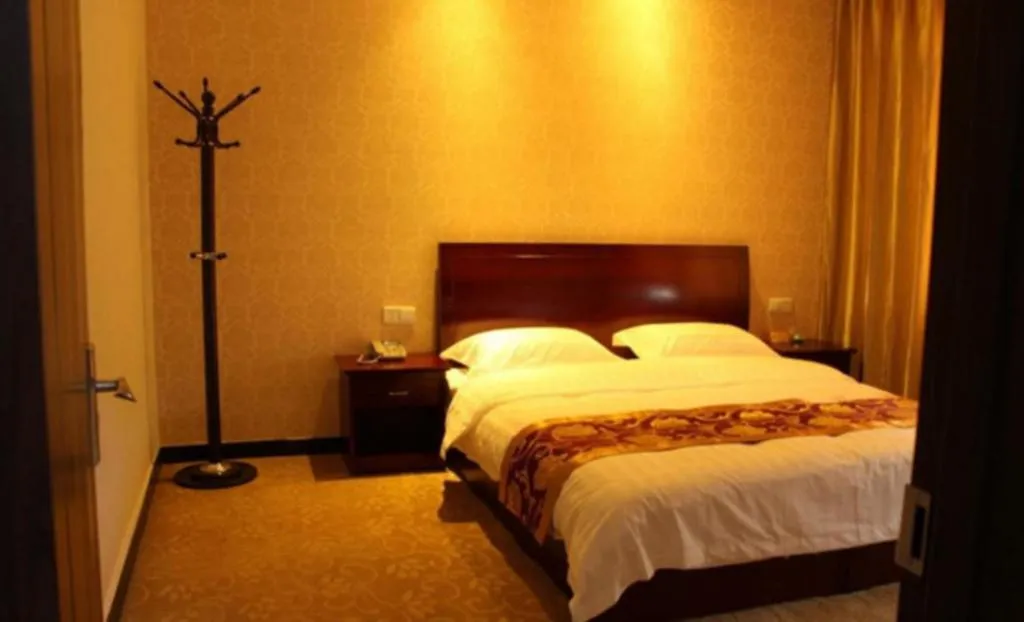 Bed in 169 Business Hotel