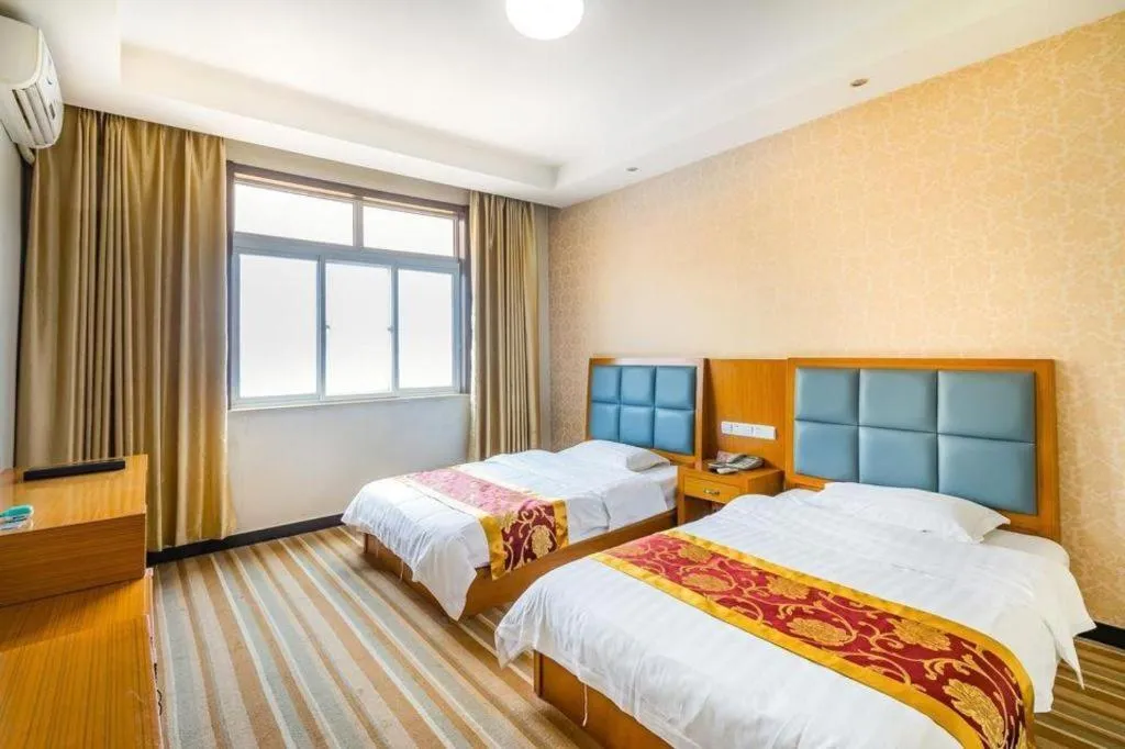 Bed in 169 Business Hotel