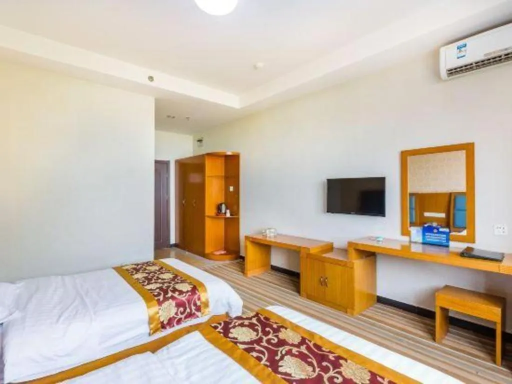 Bed in 169 Business Hotel