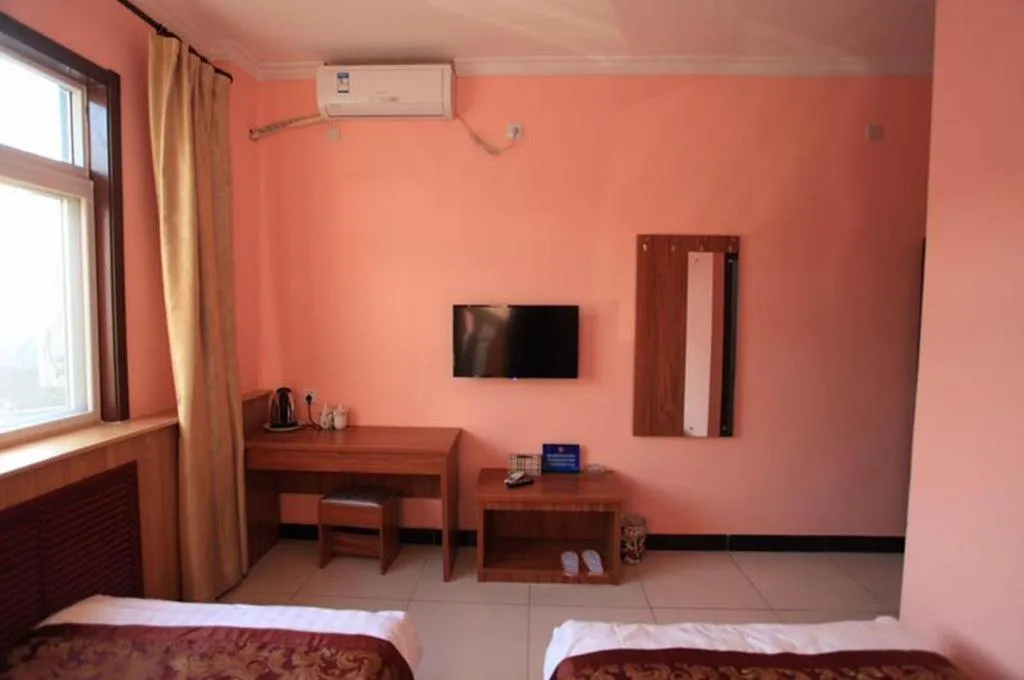 Bed in 169 Business Hotel