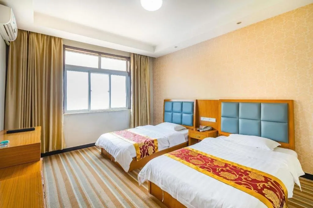 Bed in 169 Business Hotel