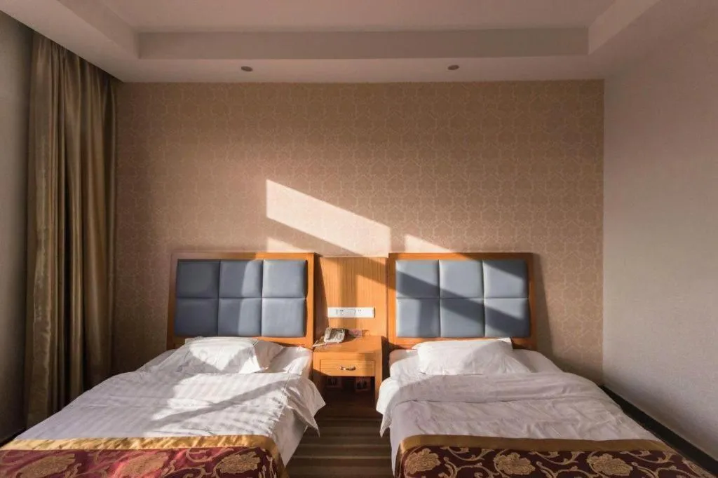 Bed in 169 Business Hotel