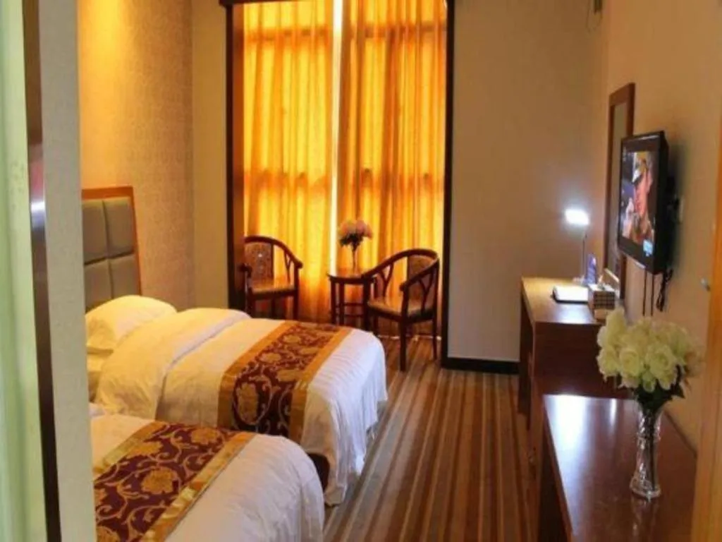 Bed in 169 Business Hotel