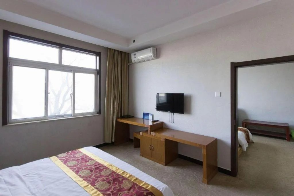 Bed in 169 Business Hotel