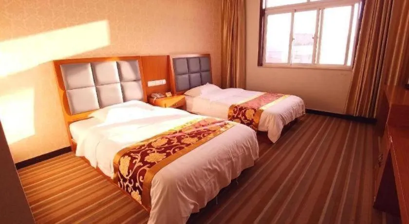 Bed in 169 Business Hotel