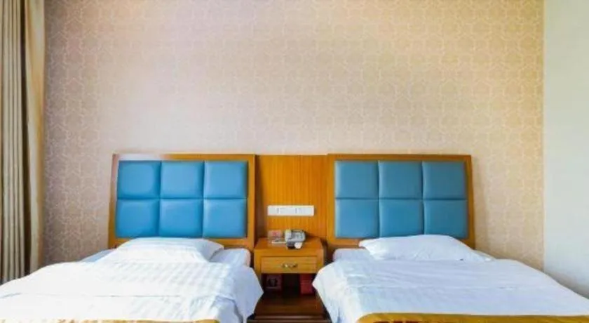 Bed in 169 Business Hotel