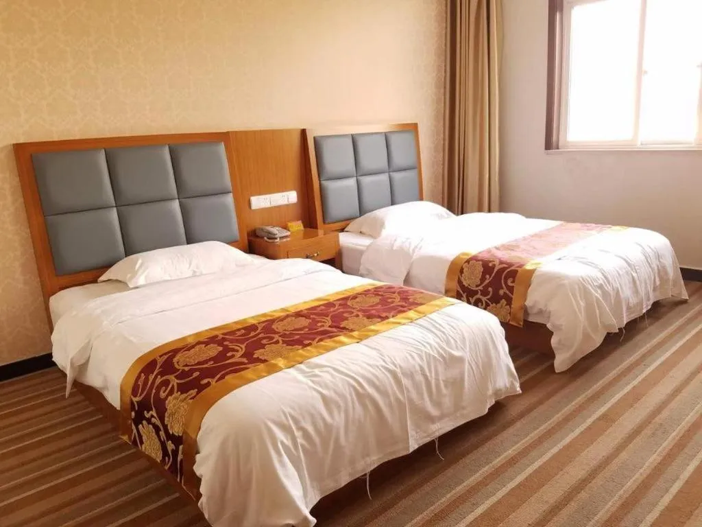 Bed in 169 Business Hotel