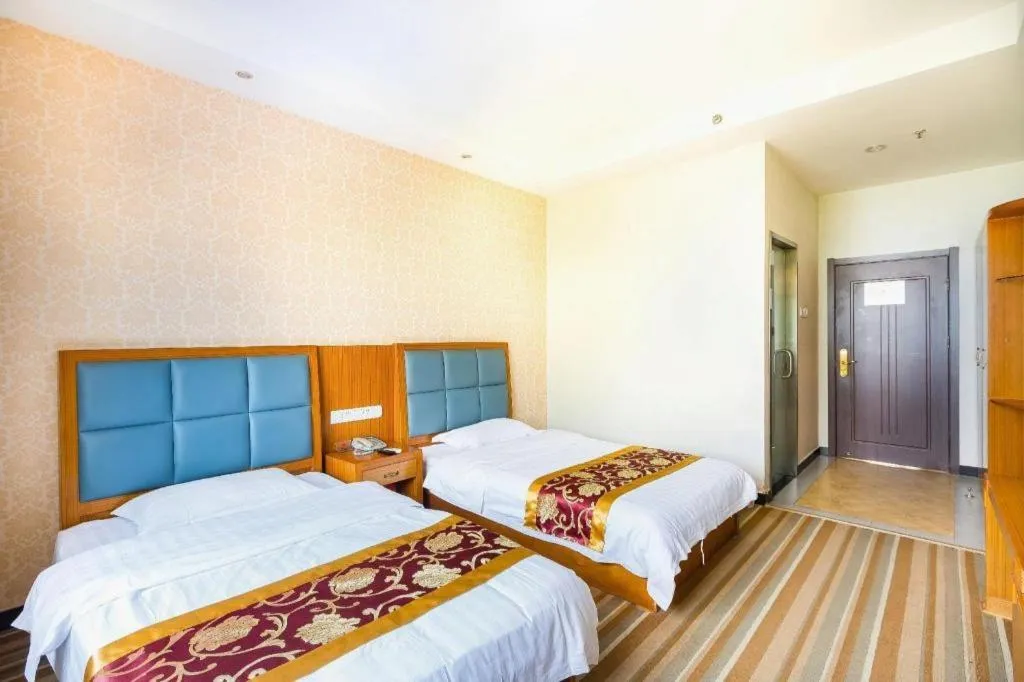 Bed in 169 Business Hotel