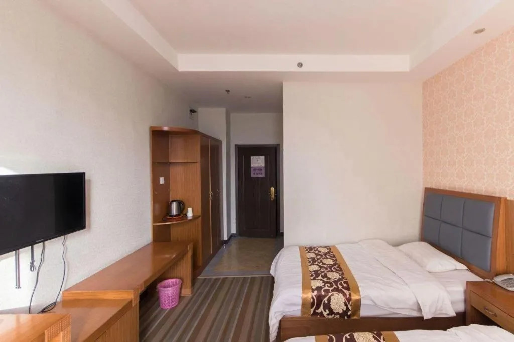 Bed in 169 Business Hotel