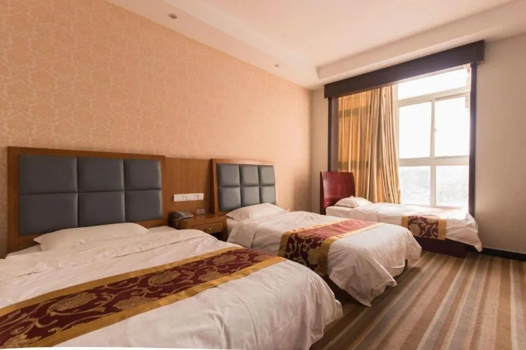 Bed in 169 Business Hotel