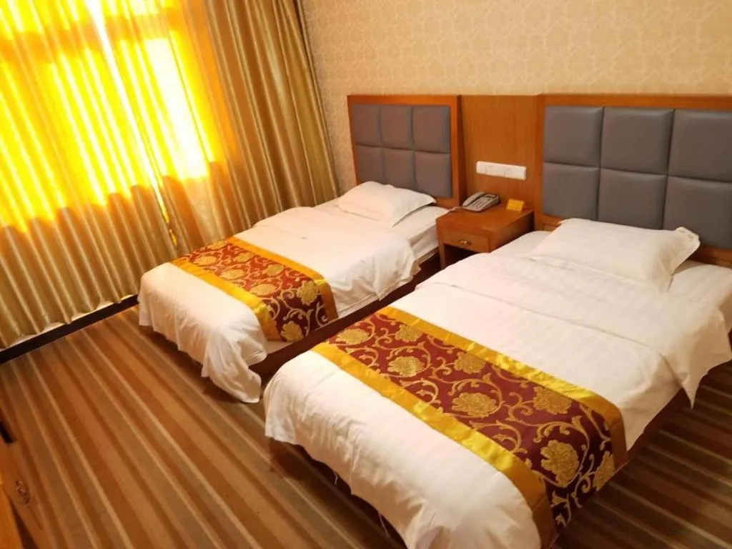 Bed in 169 Business Hotel