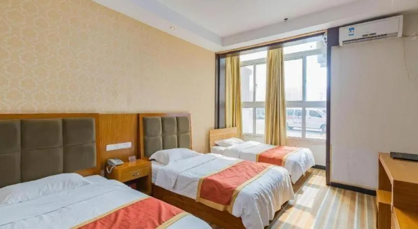 Bed in 169 Business Hotel