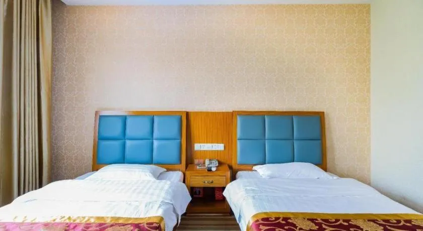 Bed in 169 Business Hotel