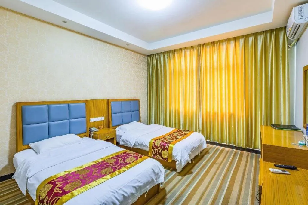 Bed in 169 Business Hotel