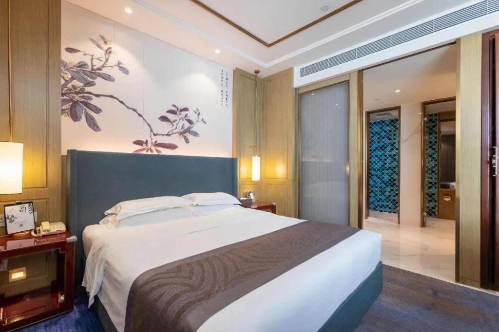 Bed in Bliss International Hotel Weihai