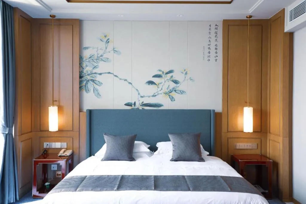 Bed in Bliss International Hotel Weihai