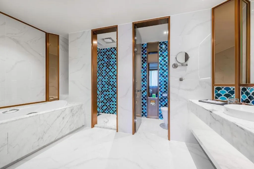 Bed in Bliss International Hotel Weihai