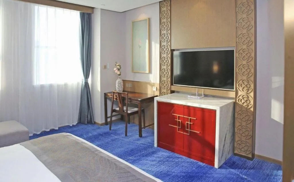 Bed in Bliss International Hotel Weihai