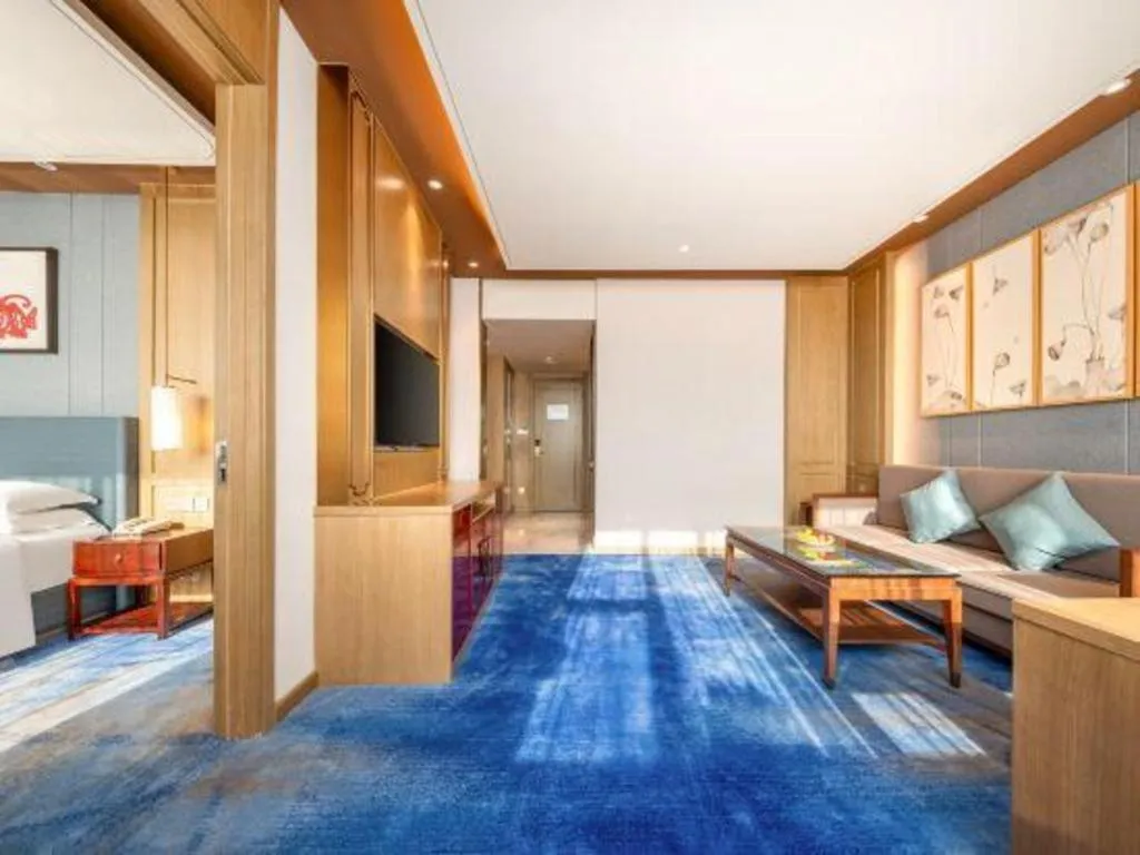 Bed in Bliss International Hotel Weihai