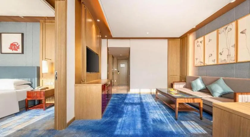 Bed in Bliss International Hotel Weihai