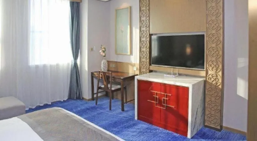 Bed in Bliss International Hotel Weihai