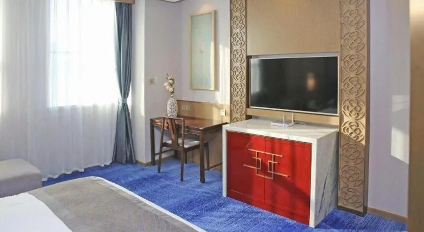 Bed in Bliss International Hotel Weihai