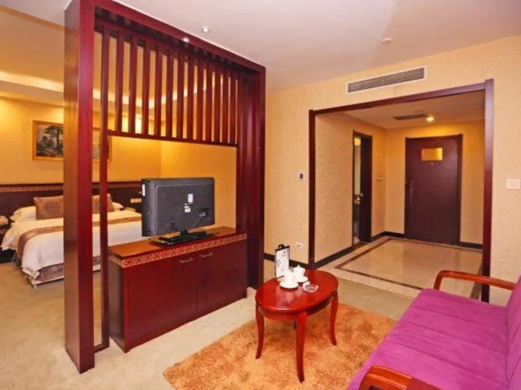 Bed in Bliss International Hotel Weihai