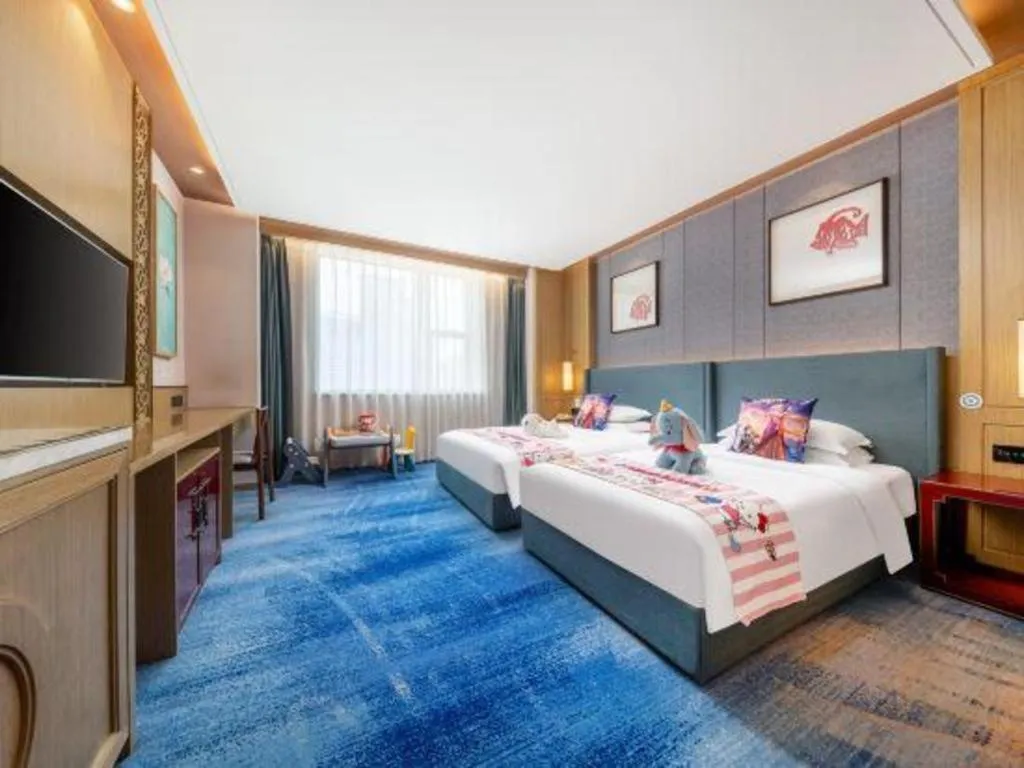Bed in Bliss International Hotel Weihai
