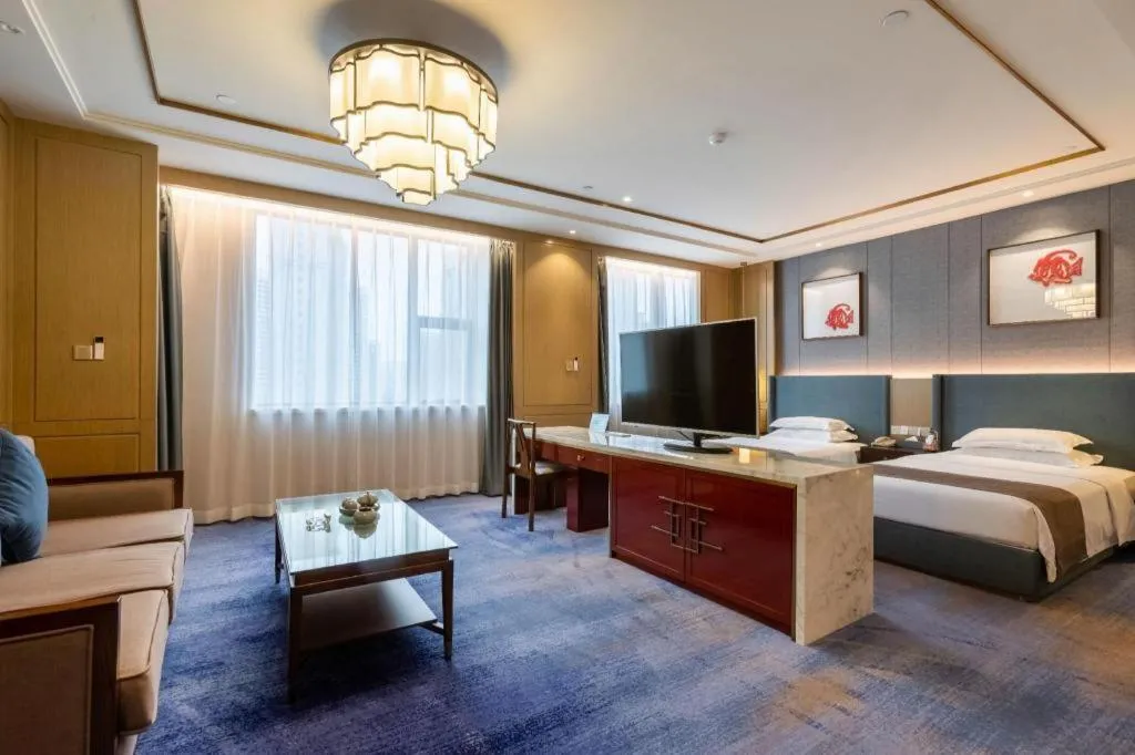 Bed in Bliss International Hotel Weihai