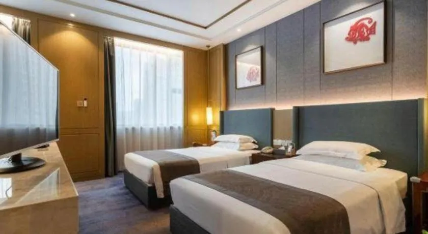 Bed in Bliss International Hotel Weihai