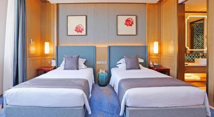 Bed in Bliss International Hotel Weihai