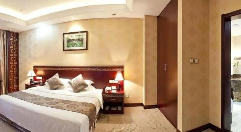 Bed in Bliss International Hotel Weihai
