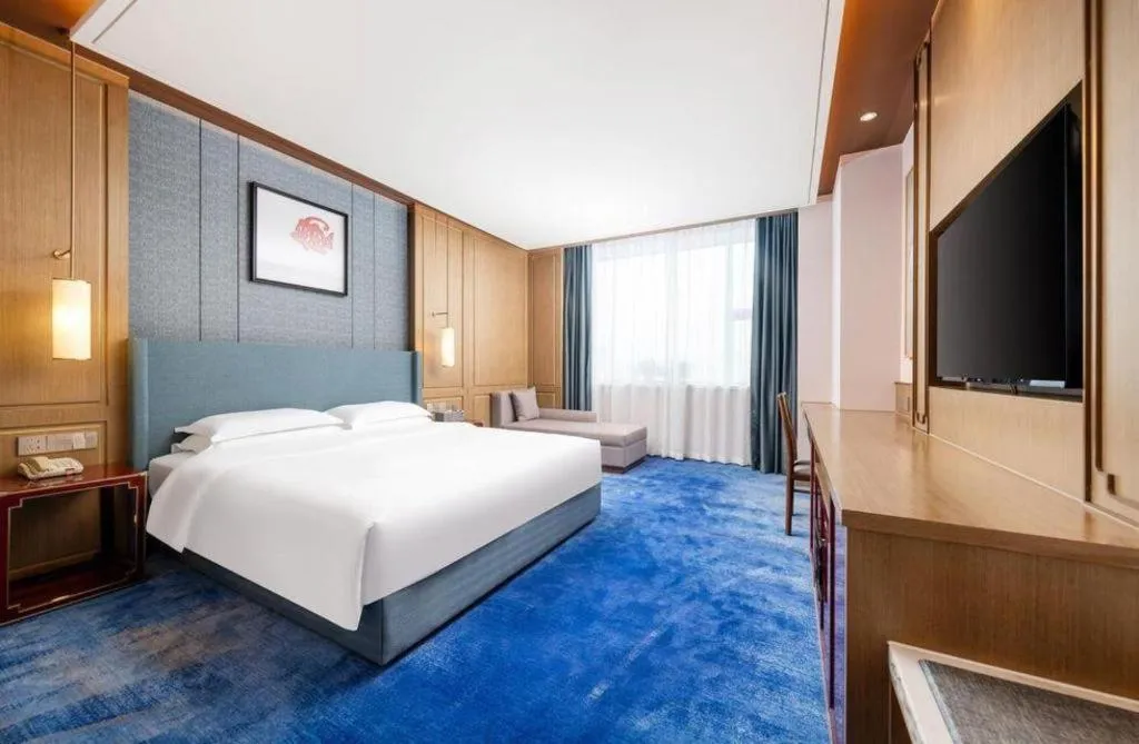 Bed in Bliss International Hotel Weihai
