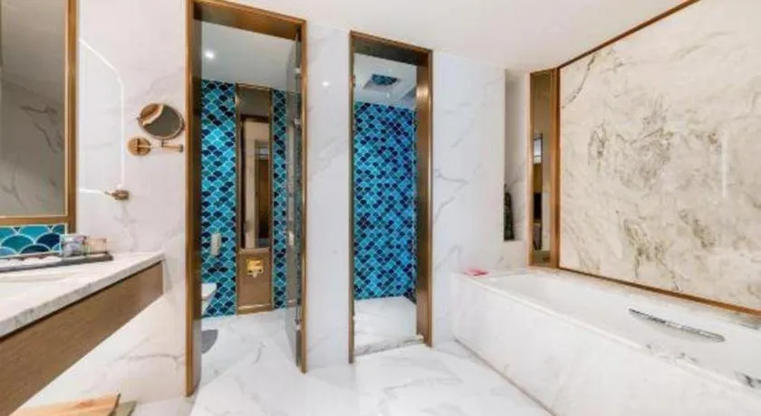 Bed in Bliss International Hotel Weihai