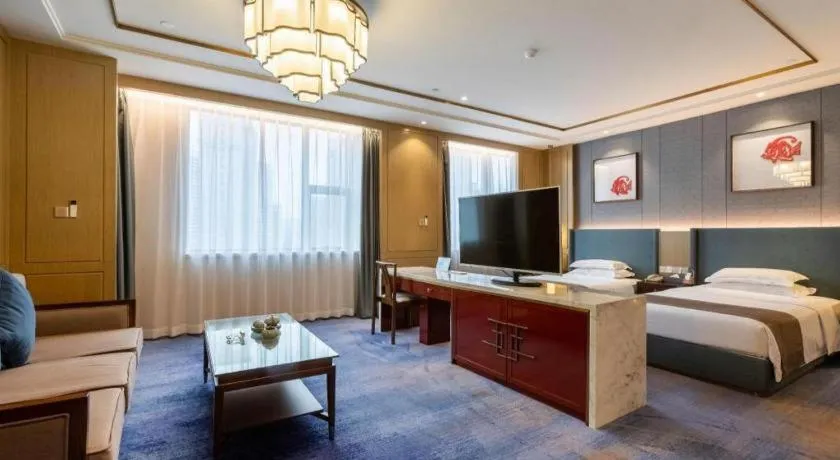 Bed in Bliss International Hotel Weihai