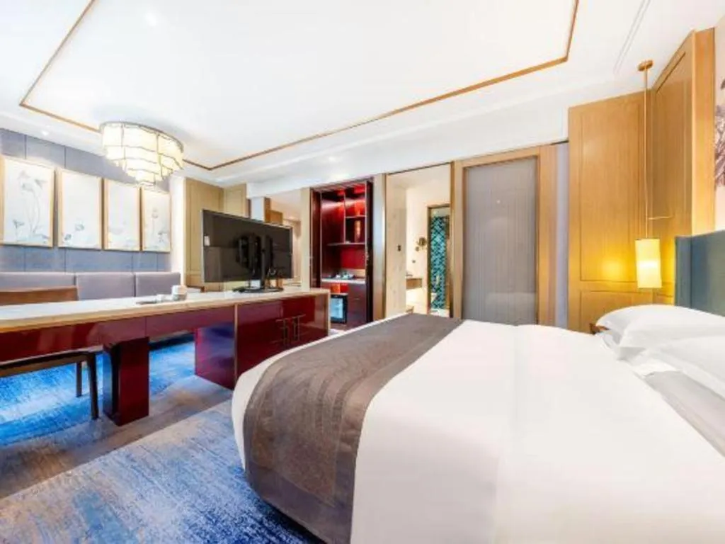 Bed in Bliss International Hotel Weihai