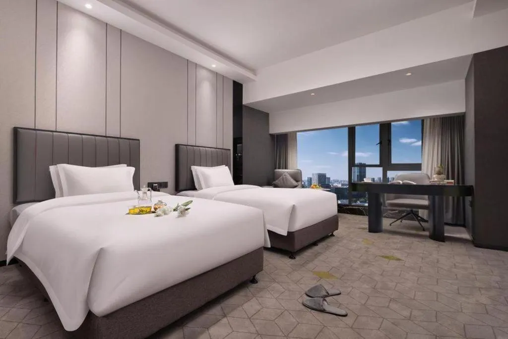 Bed in Changsha Jasmine International Hotel