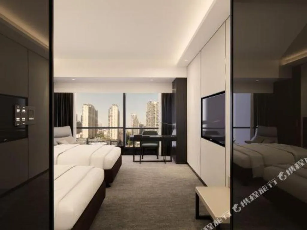 Bed in Changsha Jasmine International Hotel