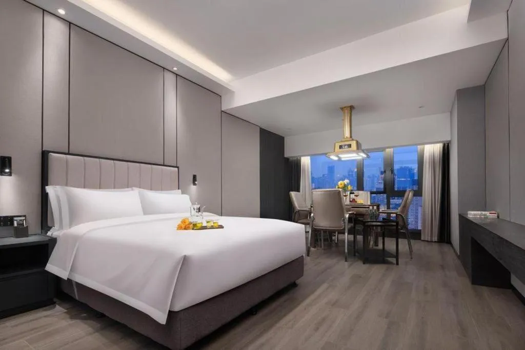 Bed in Changsha Jasmine International Hotel