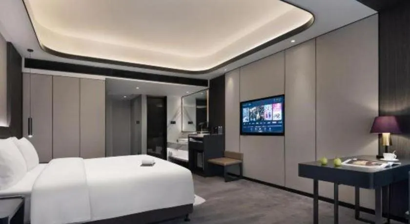 Bed in Changsha Jasmine International Hotel