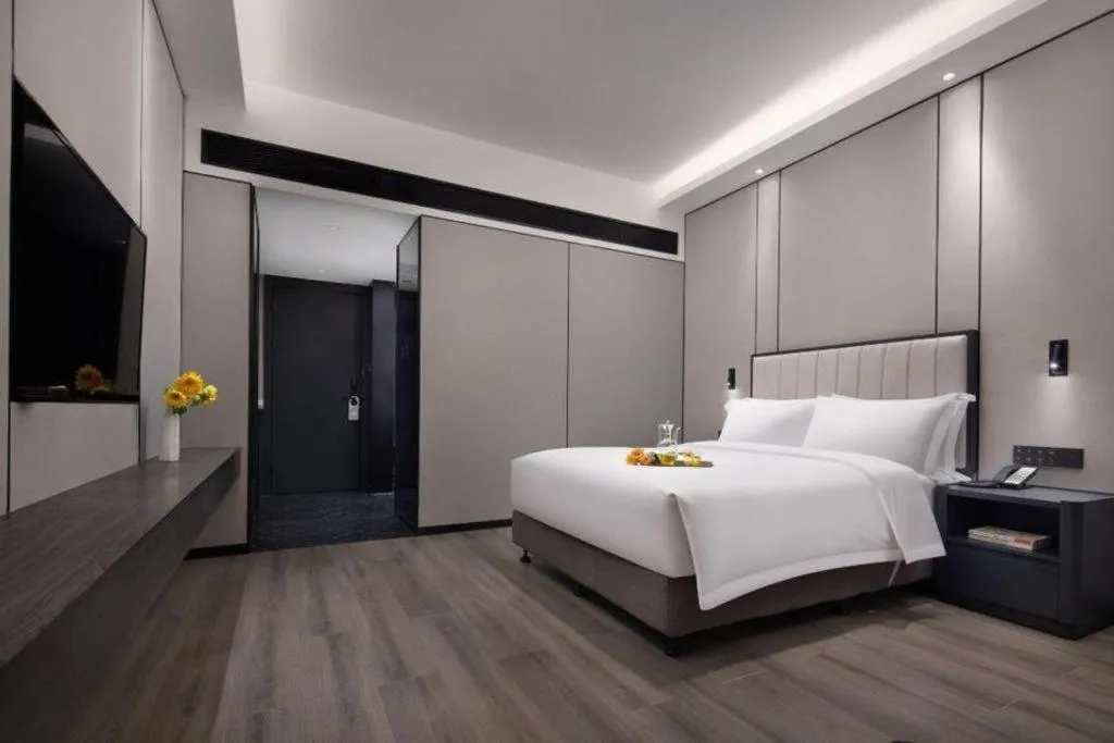 Bed in Changsha Jasmine International Hotel