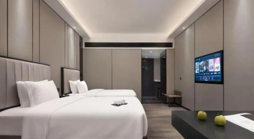 Bed in Changsha Jasmine International Hotel