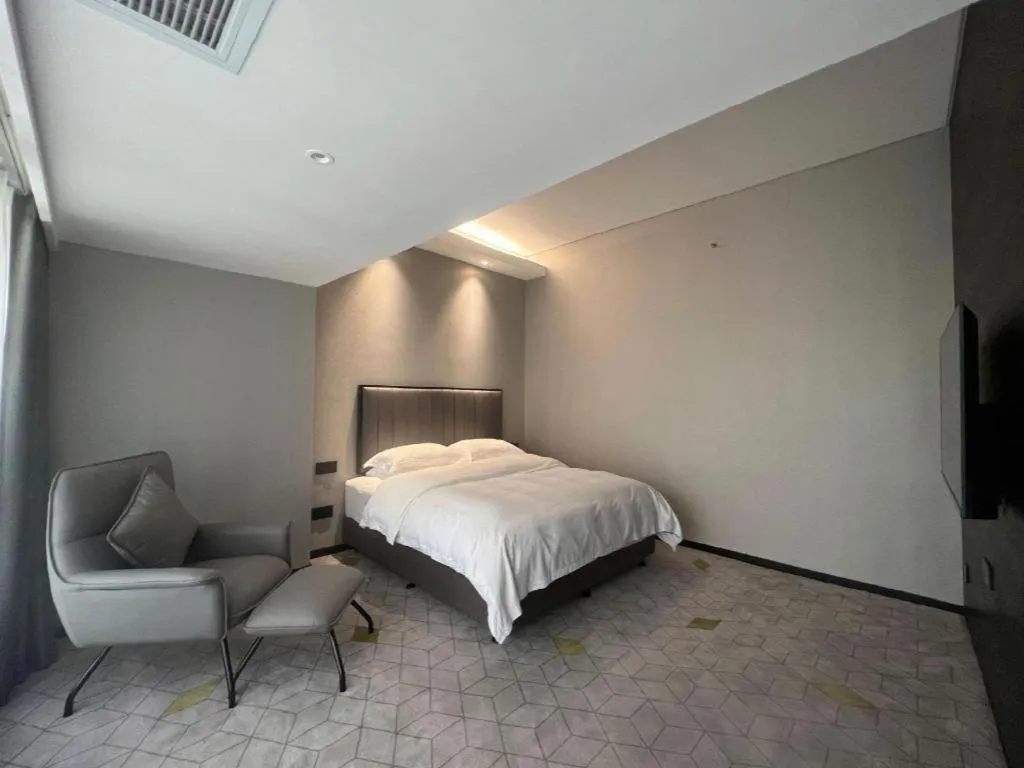 Bed in Changsha Jasmine International Hotel