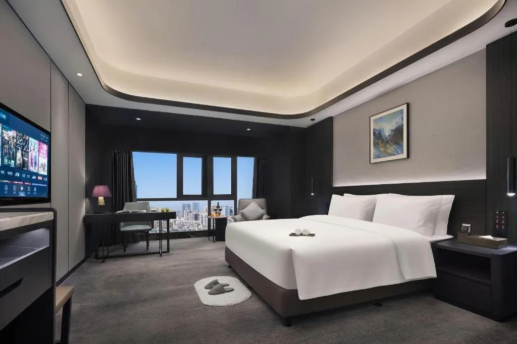 Bed in Changsha Jasmine International Hotel