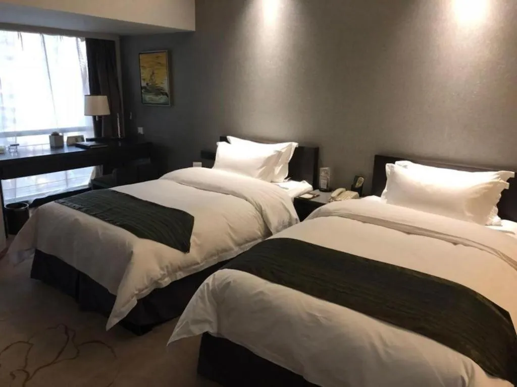 Bed in Changsha Jasmine International Hotel