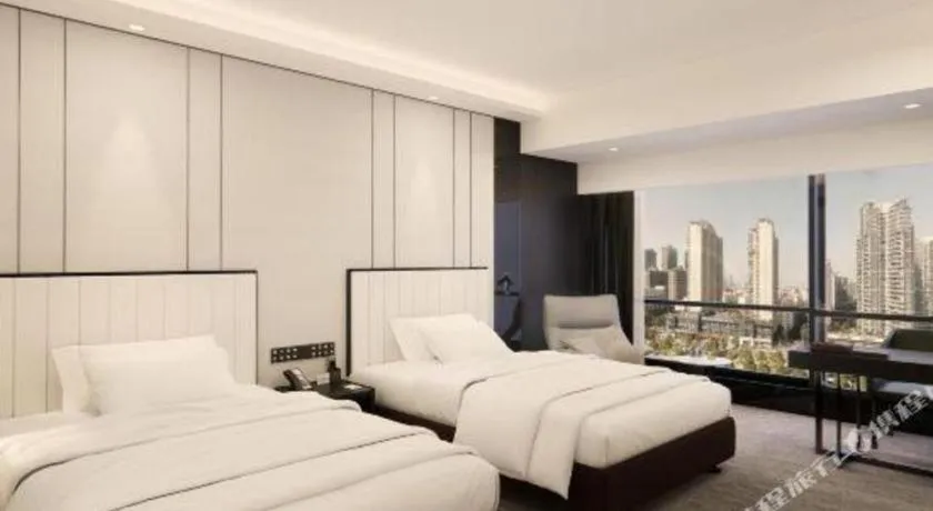 Bed in Changsha Jasmine International Hotel